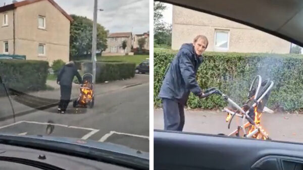 Niets aan de hand, hij maakt gewoon een wandeling met zijn brandende kinderwagen