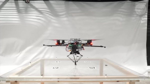 Met een 3D-printer aan een drone kunnen we straks complete huizen printen