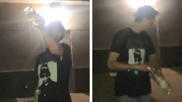 Stoere bink wil zich bewijzen door fles tegen de muur te knikkeren