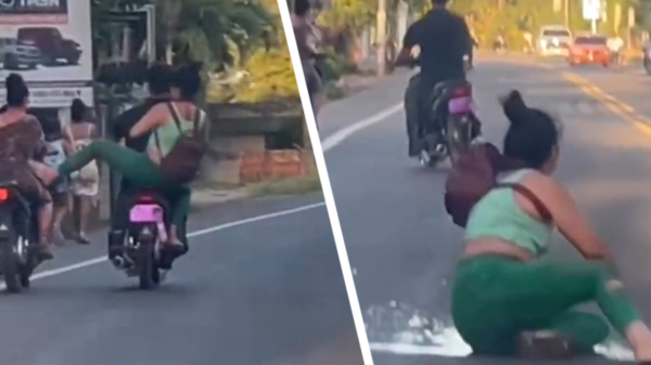 Karma voor verkeerstrut die vrouw van d'r scooter wil trappen