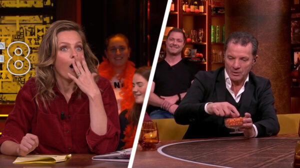 John de Bever knaagt doodleuk met haarlak ingespoten M&M's tijdens uitzending HLF8