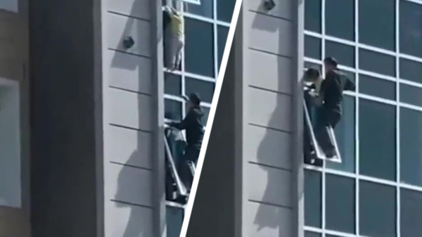Held van de dag klimt uit raam op 8e verdieping om 3-jarig meisje te redden