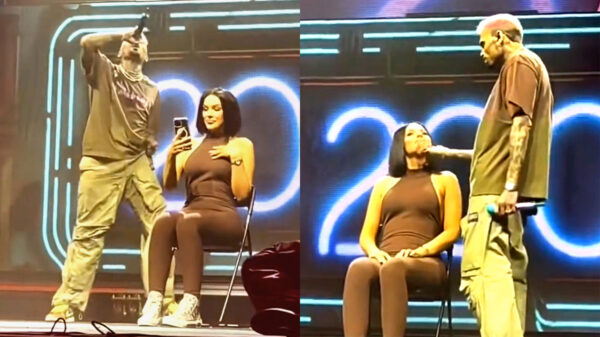 Chris Brown knikkert telefoon van fan het publiek in omdat ze blijft filmen