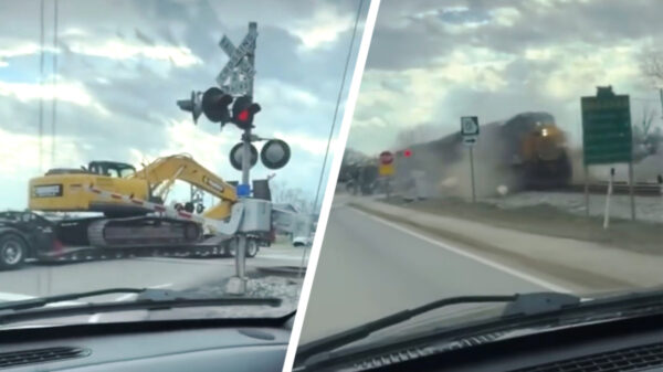 Nope, je kunt je graafmachine beter niet op een spoorwegovergang parkeren