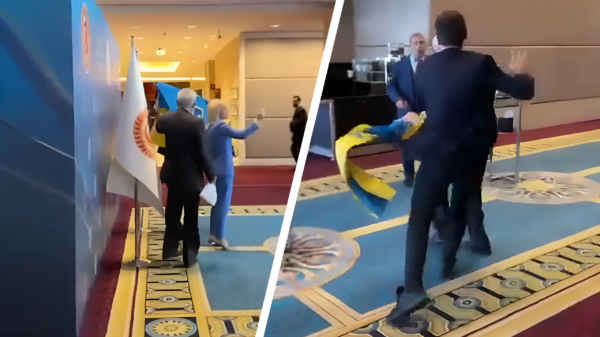 Russische diplomaat stevig aangepakt nadat hij een Oekraïense vlag weghaalt bij Turkse conferentie