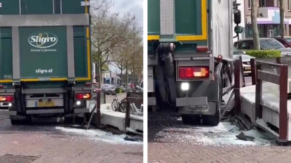 Sligro-chauffeur heeft nogal moeite met een glazen hekje