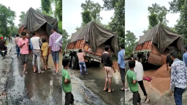 Wait for it: even een vrachtwagen vol zand uit een greppel halen