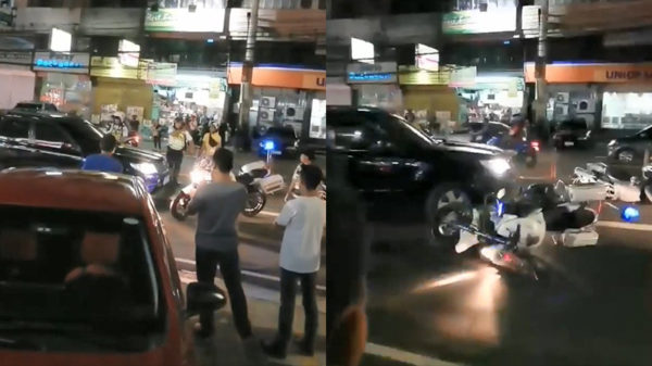 Troela in SUV heeft geen zin om naar ome agent te luisteren en beukt politiemotor omver