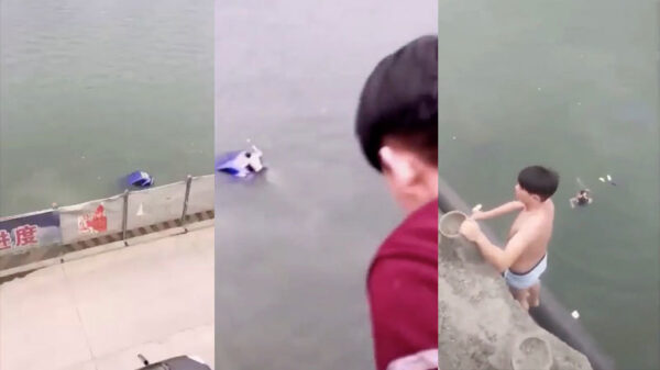 Chinees door omstanders gered uit zinkende auto