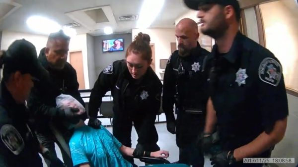 Vastgebonden vrouw wordt door agent getaserd en begint rechtszaak