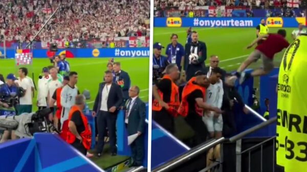 Idiote voetbalfan bespringt Cristiano Ronaldo vanaf de tribune