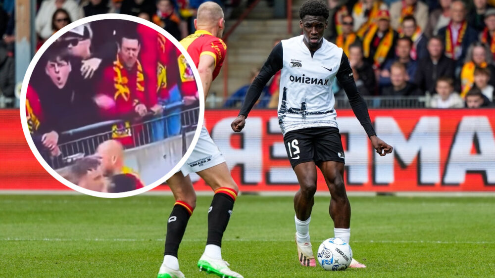 Tribunetokkie frontaal in beeld: man maakt apengebaren naar Ghanese AZ-speler