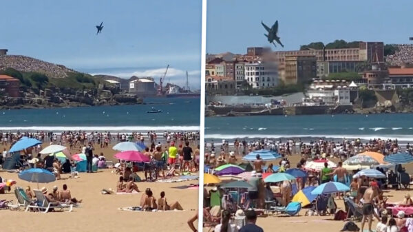 Spaanse stuntpiloot in F-18 crasht bijna op een vol strand in Gijón
