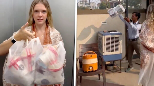 Toerist vraagt hulp met afval, Indiase beveiliger flikkert 't over het hek