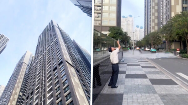 Idioot in Ho Chi Minhstad gooit jerrycans van 20 liter water van flatgebouw