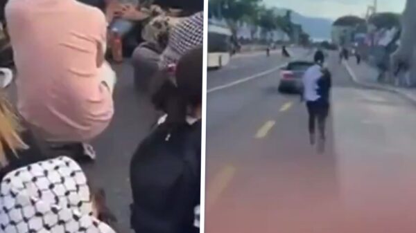 BMW raast door wegblokkerende menigte tijdens Palestina-demonstratie