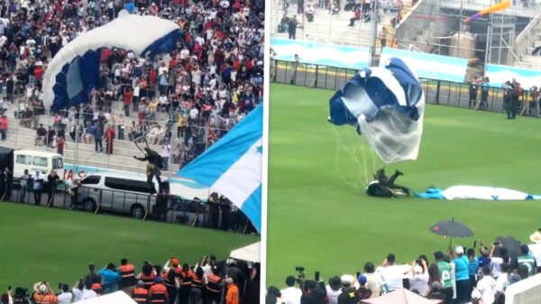 Parade in Honduras gaat fout: Parachutist van leger crasht met vlag