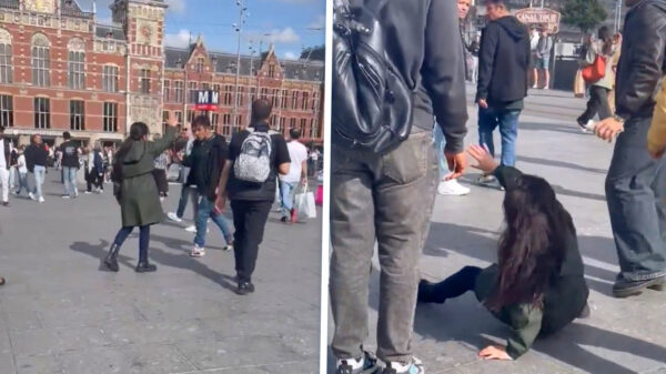 Straatprediker Yerani aan d'r haren over straat gesleurd in Amsterdam