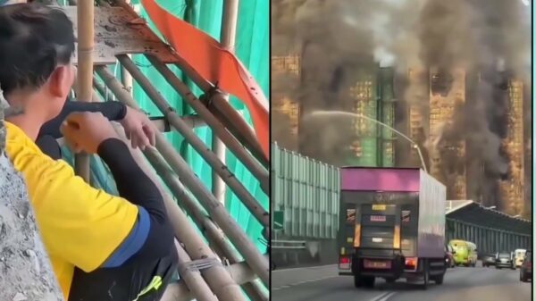 Video opgedoken van rokende werknemer vlak voor dodelijke flatbrand in Hongkong