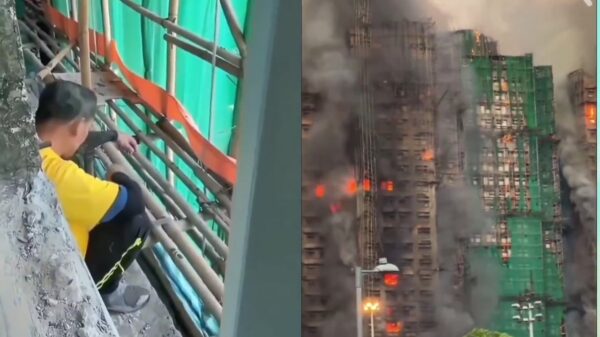 Video opgedoken van rokende werknemer vlak voor dodelijke flatbrand in Hongkong