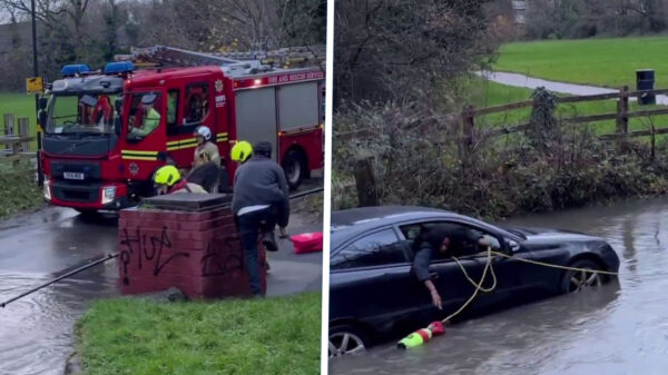 Vrouw vecht tegen woeste overstroming en ontsnapt dankzij brandweerman