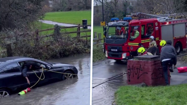 Vrouw vecht tegen woeste overstroming en ontsnapt dankzij brandweerman