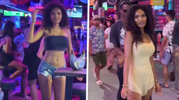 Thaise schone wandelt over straat en legt vast hoeveel kerels haar lastigvallen