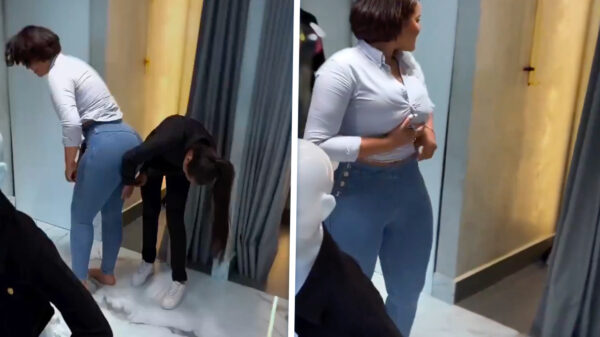 Dame met serieus achterwerk probeert zich in nieuwe broek te wurmen