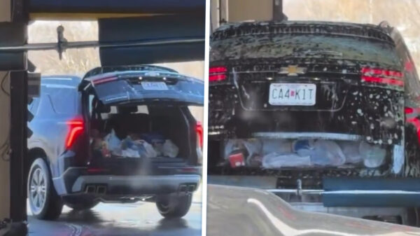 SUV rijdt wasstraat in met kofferbak open en ontdekt dat water nat is