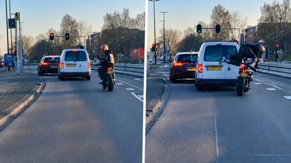 Opgefokte motorrijder kijkt niet uit z'n doppen tijdens het road ragen