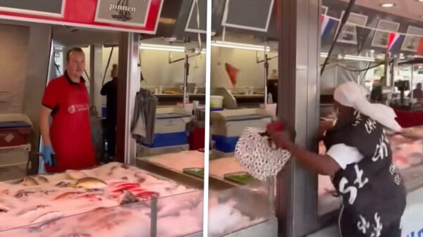 Viswijf gaat los en sloopt een viskraam op de Amsterdamse Dappermarkt