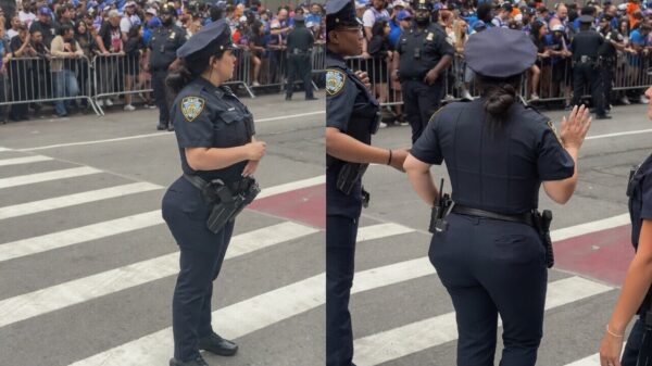 Zwaarbewapende agente houdt toezicht tijdens Knicks-parade in New York