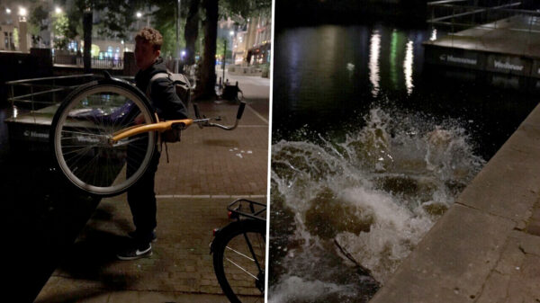 Dronken mafkees wil fiets de gracht in slingeren, maar vergeet zichzelf