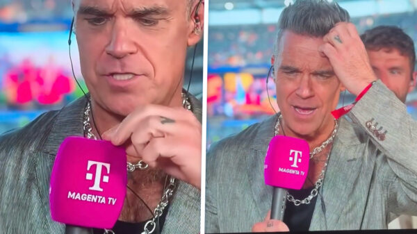 Oeps! Robbie Williams verliest 'wit brokje' live op Duitse tv tijdens WK-finale