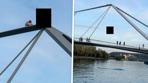 Brandende man springt van 23 meter hoge brug in Luik, politie onderzoekt stunt