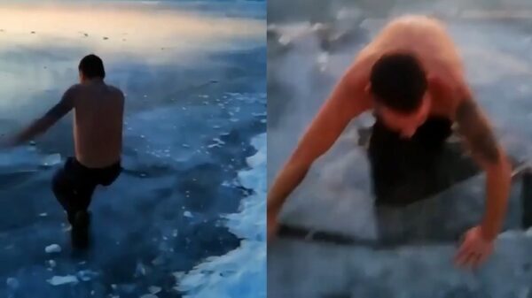 Russische nieuwjaarsduik verloopt niet helemaal vlekkeloos