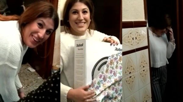 Vrolijke dame heeft de grootste pret om haar nieuwe schoonmaakrobot