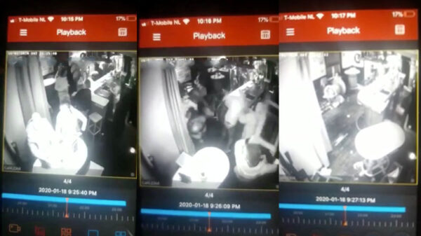 Eencellige Feyenoord- en Heerenveensupporters klappen erop in een café in Woerden