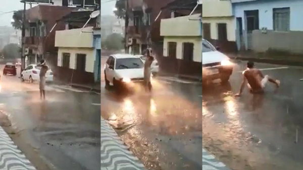 Braziliaan wordt aangereden als hij midden op straat relaxed staat te douchen