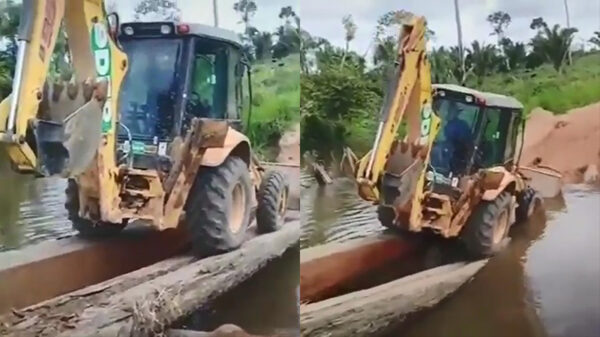 Graafmachine heeft ietwat moeite om krakkemikkige brug over te steken