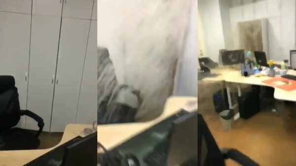 Water spuit uit kantoorkast tijdens extreme wateroverlast