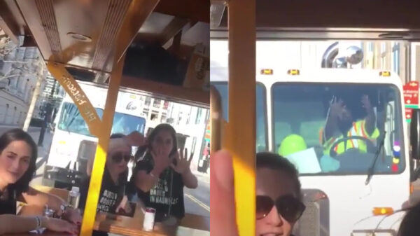 Pakketbezorger besluit ook even gezellig met de bierfiets mee te doen