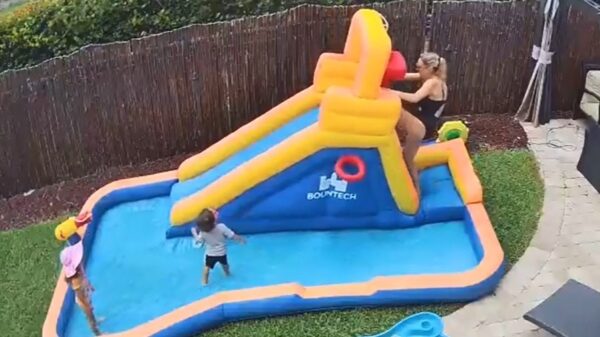 Mama wil ook een keertje van de glijbaan