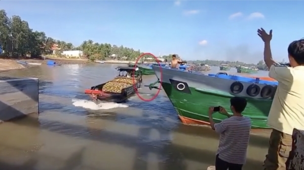 Vietnamees bootje van rechts krijgt geen voorrang van het anker