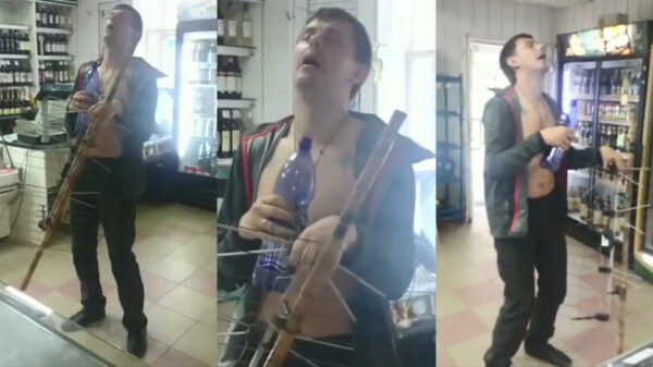 Vermoeide Rus houdt zijn powernap staand in de buurtsuper