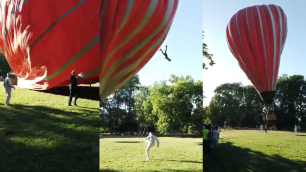 Man blijft in touw luchtballon hangen en vliegt metershoog de lucht in