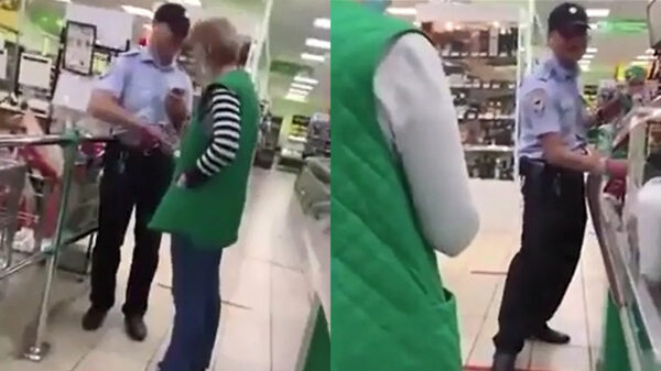 Russische politieagent betrapt op het jatten van flessen sterke drank