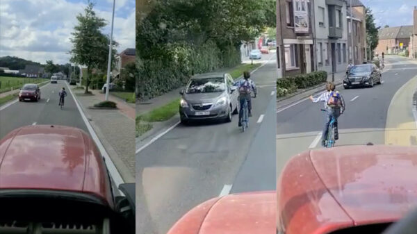 Belg rijdt midden op drukke weg, gooit middelvingers en klopt op autodak