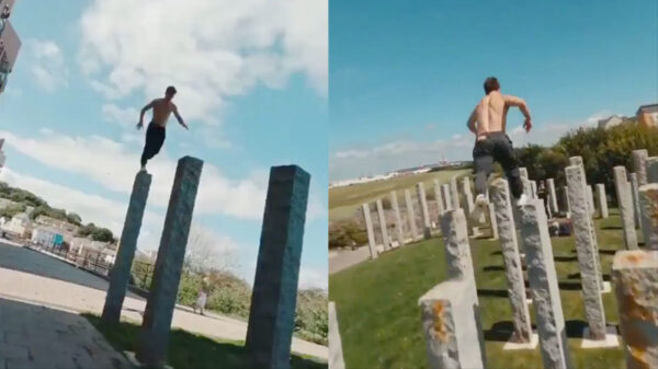 Parkourprofessional heeft geen enkele moeite met een setje hoge palen