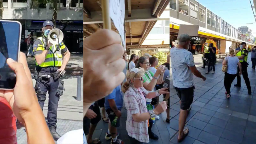 Protest in Rotterdam tegen het verplicht dragen van een mondkapje